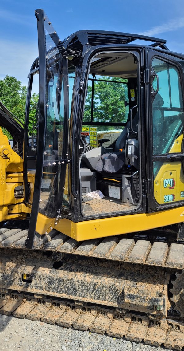 Photo Heavy Equipment Forestry mulching excavator cab cage with removable door and polycarbonate windshield Reaper Custom Fabrication Matt Greene welding King Tobaccoville Winston-Salem NC